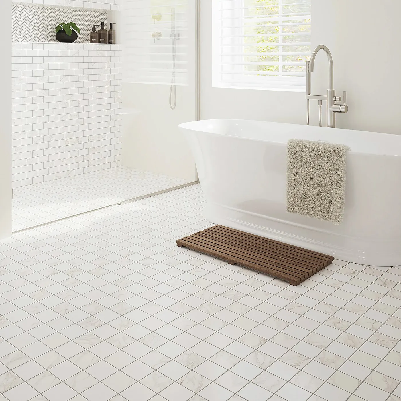 White bathroom with tile flooring, standalone tub, and glass-enclosed shower